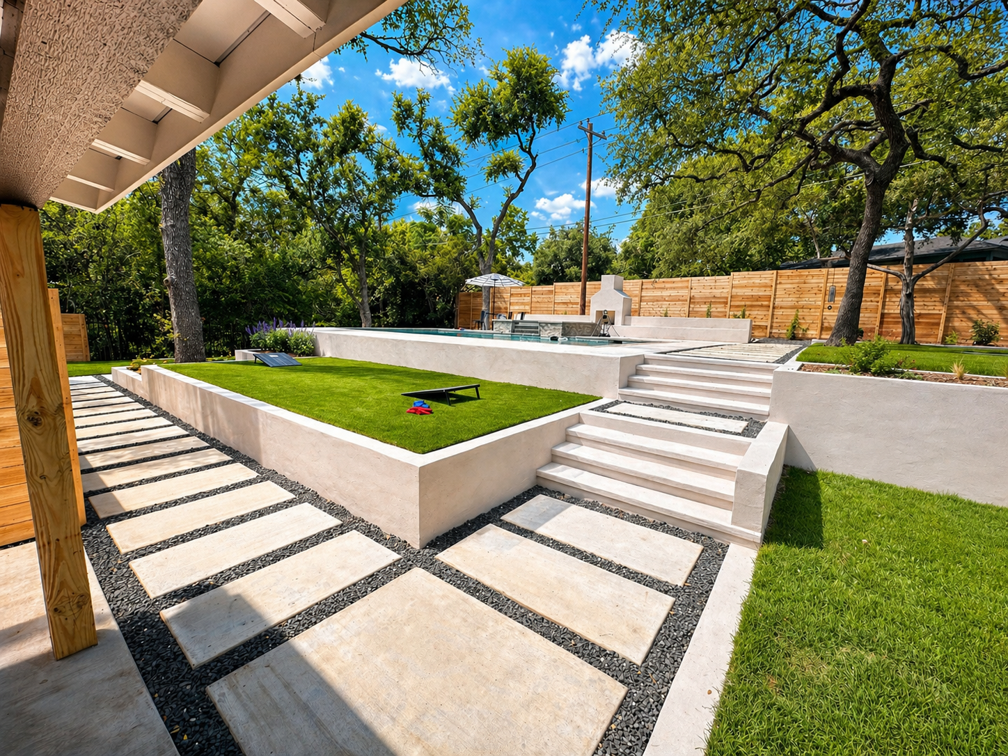 Paul's Lawn tiered residential hardscape and turf install