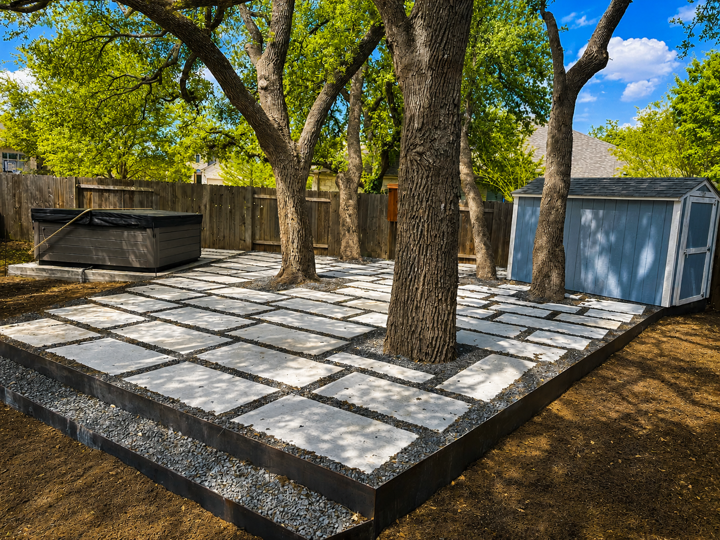 Limestone patio and retaining wall hardscape by Paul's Lawn, Austin